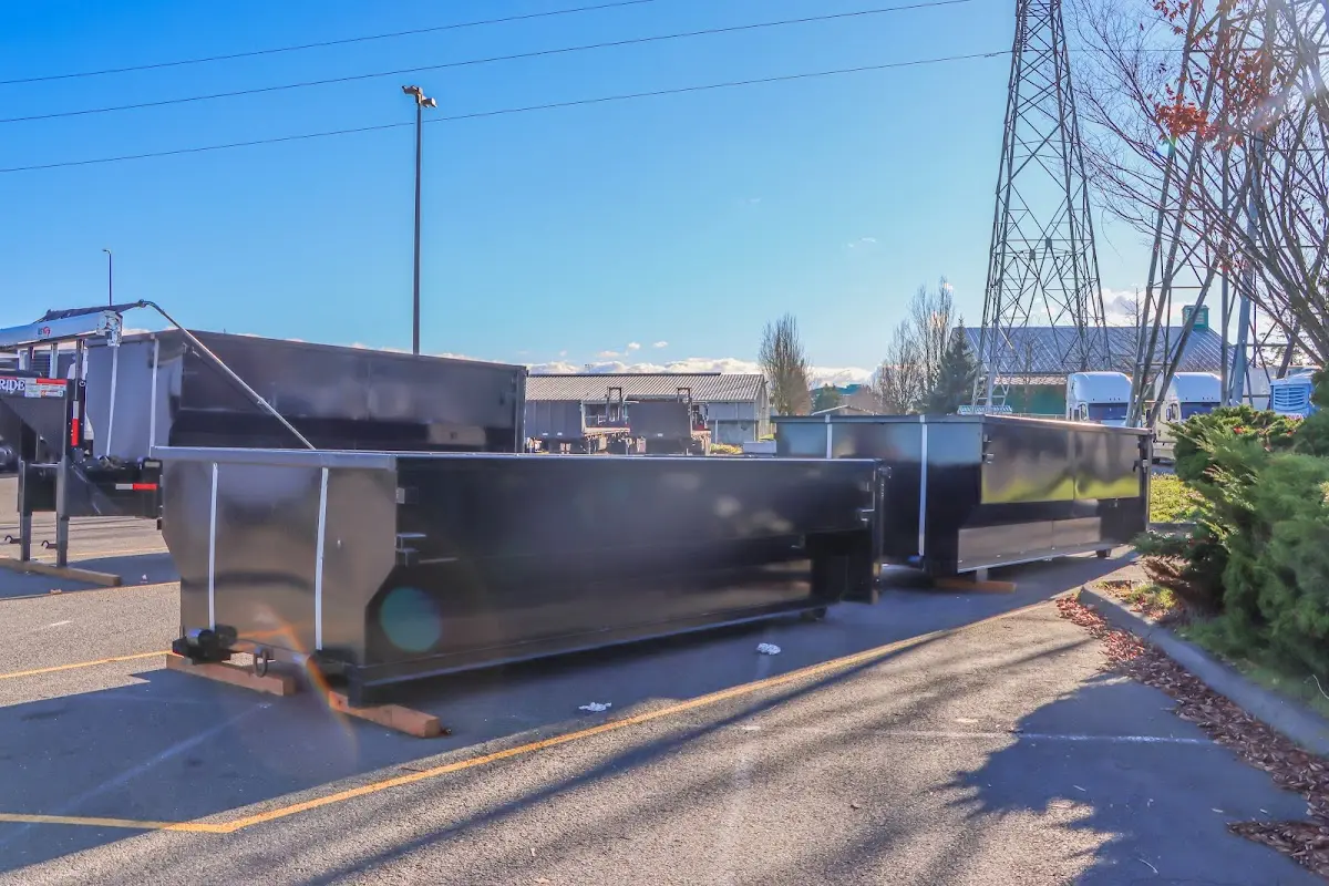 Roll-off dumpster ready for waste disposal at job site for 3 Yard Dumpster Rental in Melrose